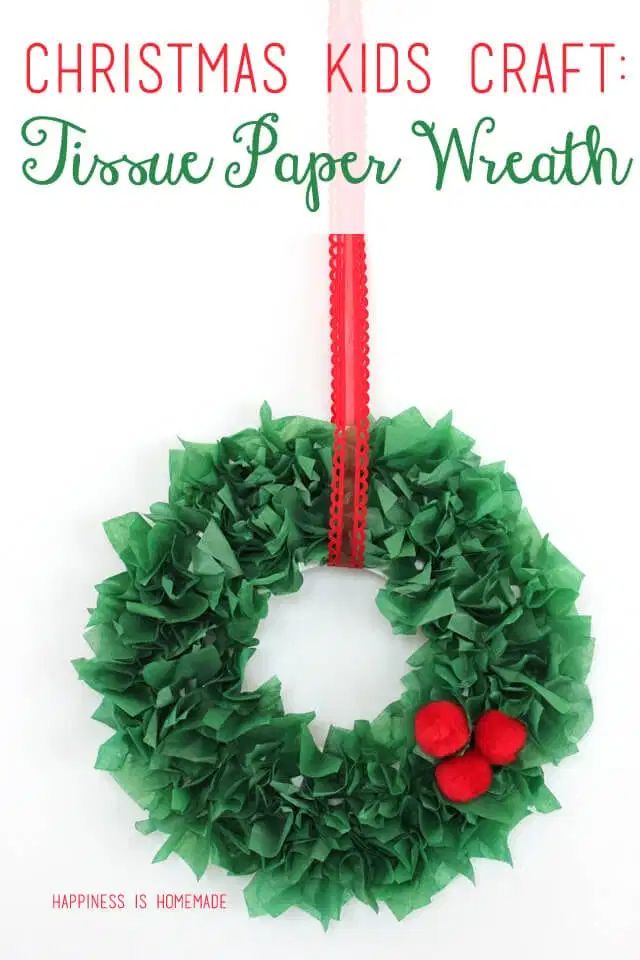 a christmas wreath made out of tissue paper with the words, christmas kids craft tissue paper wreath