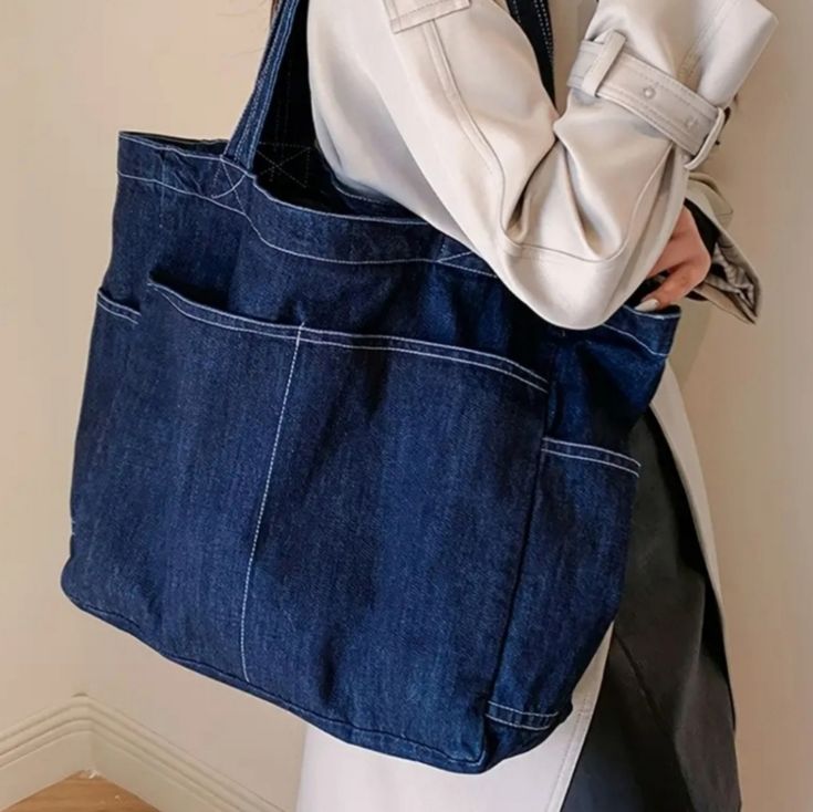 New, High-Quality Boutique Item Without Branding. Brand New From Distributor, No Actual Tags. Love It? Buy It! This Denim Tote Bag Is The Perfect Blend Of Retro Style And Modern Functionality. Made Of Sturdy Denim Fabric, This Large Tote Bag Offers A Stylish And Versatile Design That Suits Any Occasion, Whether For Travel, Work, Or School. Its Multiple Pockets Provide Ample Storage Space To Keep Your Essentials Organized And Secure. This Denim Fark Blue Tote Bag With A Zipper Is A Stylish And Pr Jeans Bags Ideas, Outfit Gym, Handbags For School, Denim Shoulder Bags, Bag Women Fashion, Trendy Denim, Denim Tote Bags, Denim Tote, Jeans Bag