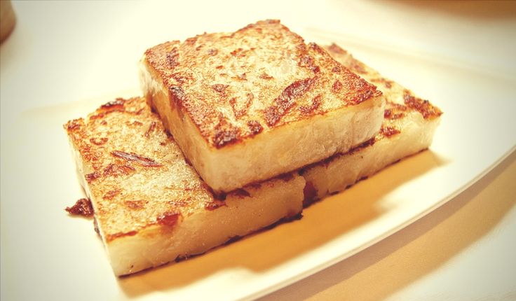 two pieces of toast on a white plate