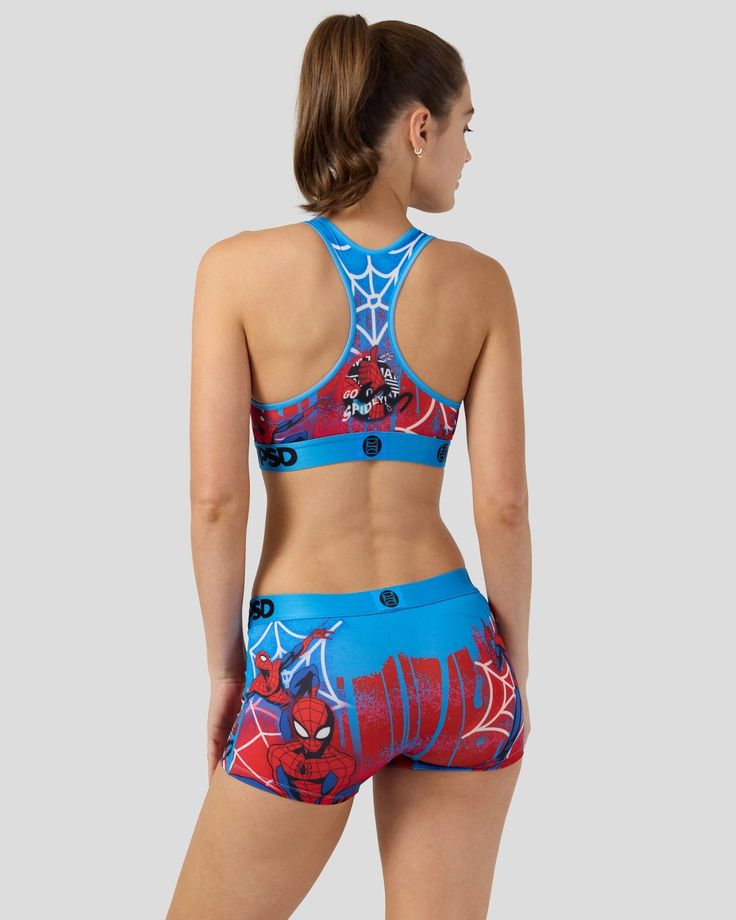 Our latest Spider-Man style just swung into town. The Peter Parker Sports Bra is made from a silky poly blend and is breathable yet slightly compressive, bringing you the comfort and support you need for everything you get into. | Women's Marvel - Peter Parker Drip Sports Bra, Size Small, Polyester/Blend - PSD Padded Stretch Sportswear Activewear, Sporty Padded Swimwear For Workout, Padded Fitted Activewear For Running, Fitted Go-dry Sports Bra For Sports Events, Fitted Swimwear With Light Support For Sports, Sporty Fitted Swimwear With Light Support, Fitted Padded Sports Bra For Running, Nylon Stretch Swimwear For Sports Events, Padded Fitted Sportswear Activewear