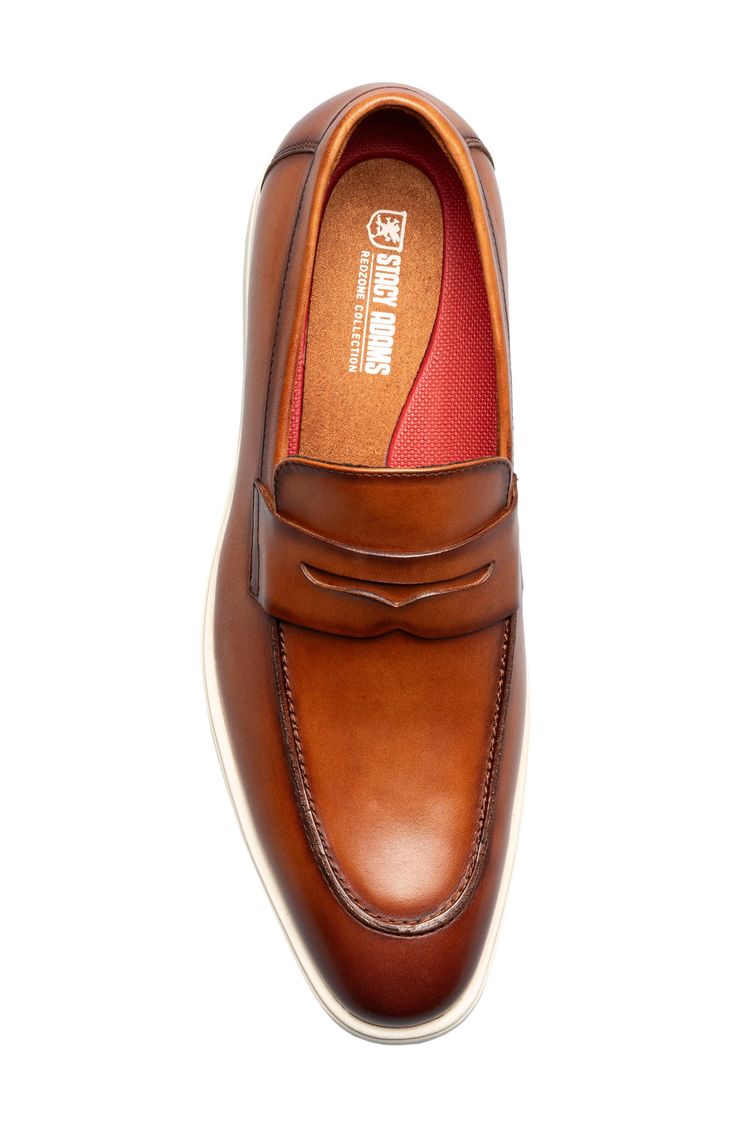 A classic penny keeper and moc toe add timeless elements to a burnished leather loafer grounded by a durable rubber sole. Removable, cushioned insole with arch support Leather and synthetic upper/textile lining/rubber sole Imported Classic Slip-on Moc Toe Boat Shoes, Classic Brown Boat Shoes With Cushioned Footbed, Classic Moc Toe Slip-ons With Cushioned Footbed, Classic Slip-ons With Cushioned Footbed, Classic Moccasins With Cushioned Footbed And Moc Toe, Slip-on Tassel Loafers With Moc Toe, Classic Slip-ons With Cushioned Footbed And Moc Toe, Classic Slip-on Dress Shoes With Cushioned Footbed, Classic Boat Shoes With Leather Footbed