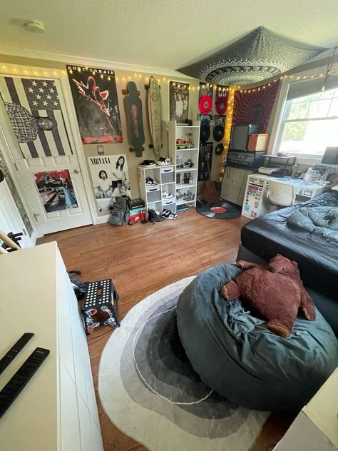 a room filled with lots of furniture and decor on the walls, including a round bed