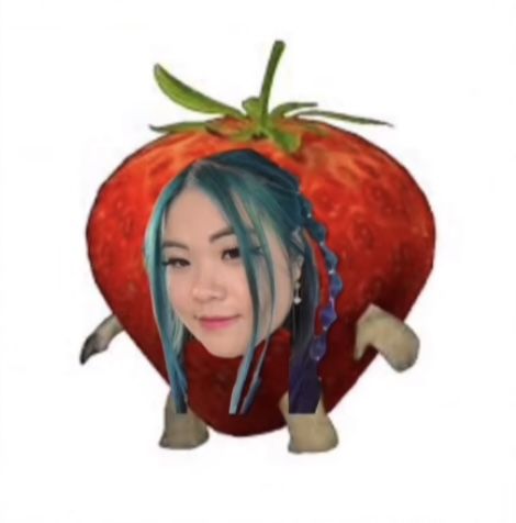 a woman with blue hair standing in front of a strawberry