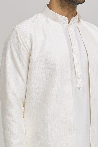 Cream jacket with thread embroidered stripe patterns. Comes with inner kurta and pant. - Aza Fashions Cotton Nehru Jacket With Long Sleeves For Eid, Cotton Nehru Jacket With Long Sleeves For Wedding, Traditional Cotton Outerwear For Eid, Long Sleeve Cotton Nehru Jacket For Eid, Long Sleeve Cotton Nehru Jacket For Wedding, Cotton Nehru Jacket With Chikankari Embroidery, Cotton Long Sleeve Nehru Jacket For Weddings, Cotton Long Sleeve Outerwear For Eid, Long Sleeve Cotton Outerwear For Eid