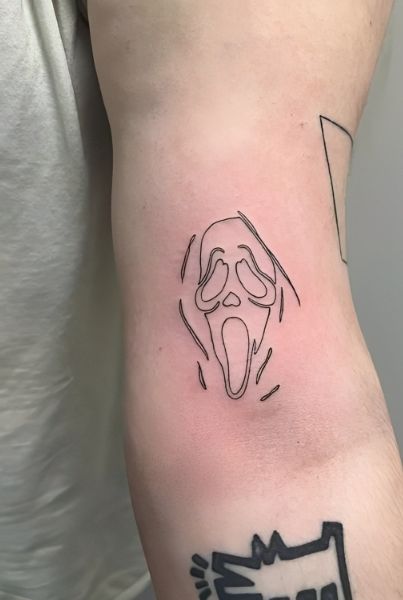 fine line tattoo of ghostface from wes craven's 1996 horror film, 'scream'. Scream 1996 Tattoo, Ghost Face Fine Line Tattoo, Simple Ghost Face Tattoo, Small Horror Movie Tattoos Simple, Scream Tattoo Outline, Fine Line Horror Tattoo, Ghostface Tattoo Simple, Simple Scream Tattoo, Spooky Simple Tattoos