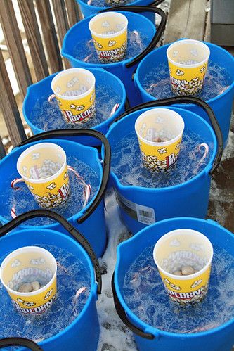 six buckets filled with ice and water