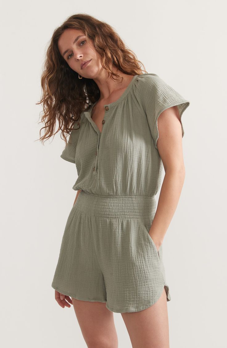 Gauzy, lightweight double-cloth cotton lends breezy style to this short-sleeve romper shaped by smocking at the waist. Button half placket Band collar Short sleeves Front slant pockets Smocked waist 100% cotton Hand wash, dry flat Imported Summer Cotton Jumpsuits And Rompers With Short Sleeves, Summer Daywear Short Sleeve Jumpsuits And Rompers, Summer Daywear Jumpsuits And Rompers With Short Sleeves, Summer Jumpsuits And Rompers With Short Sleeves Relaxed Fit, Summer Short Sleeve Jumpsuits And Rompers For Daywear, Spring Daywear Jumpsuits And Rompers With Short Sleeves, Spring Daywear Short Sleeve Jumpsuits And Rompers, Spring Daywear Jumpsuits With Short Sleeves, Spring Short Sleeve Daywear Jumpsuits And Rompers