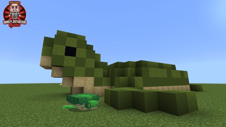 an image of a green dinosaur in the grass