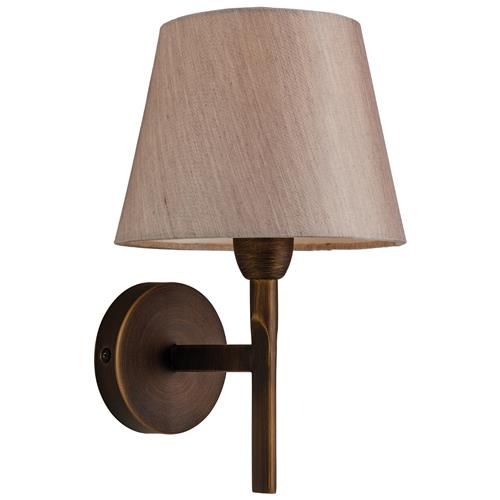 a wall light with a beige shade on it