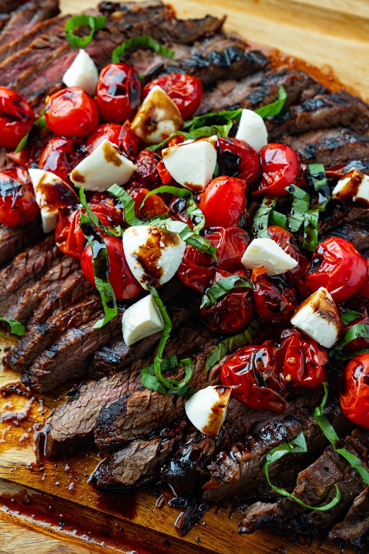 steak with cherry tomatoes, mozzarella and basil