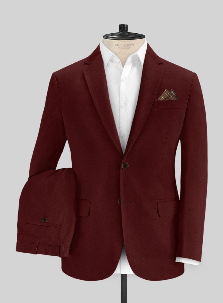 Balance your smart and formal wardrobe with our Italian Wine Cotton Stretch suit that is definitely going to give gives an update on your styling. Crafted from cotton lycra blend, donning this modern tailored suit will be an easy way to command the room, also giving you a polished and sharp look hinting a no - nonsense attitude.   Look Includes  Italian Wine Cotton Stretch Fabric  Two Button Jacket Style  Notch Lapel  Horn Brown Buttons  Single Vent  Three Cuff Buttons  Two Welted Back Pockets o Slim Fit Cotton Suits For Workwear, Slim Fit Cotton Suit For Work, Fitted Cotton Blazer For Work, Fitted Cotton Formal Set, Semi-formal Fitted Cotton Sets, Fitted Cotton Sets For Formal Occasions, Fitted Cotton Sets With Notch Lapel, Fitted Cotton Set For Semi-formal Occasions, Fitted Cotton Suit With Notch Lapel