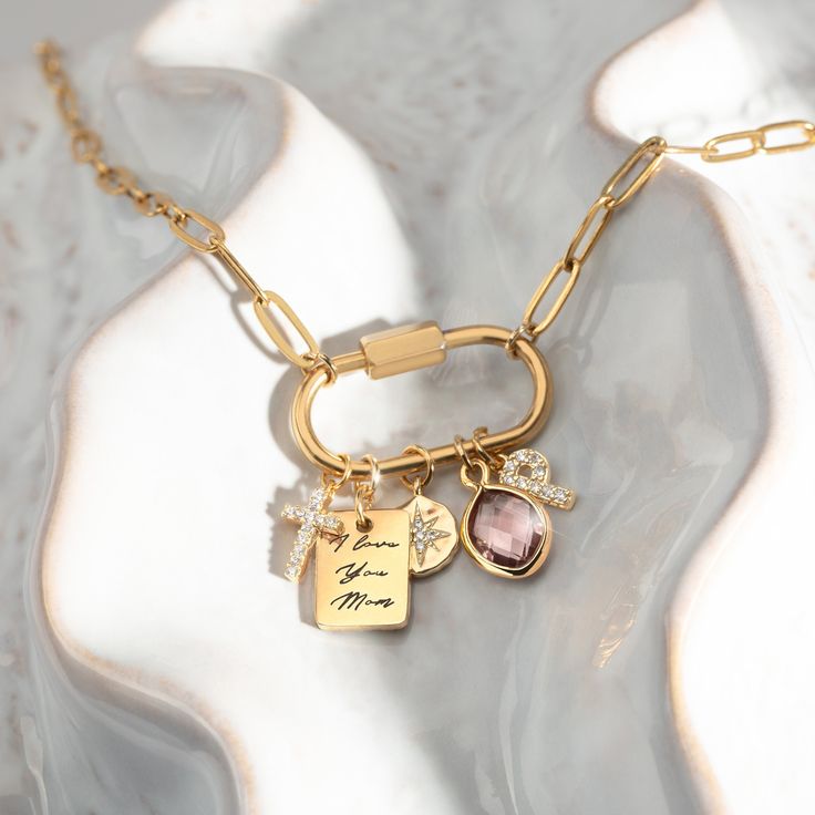 This elegant and adjustable Gold Charm Necklace is the perfect personalized gift for women. The sleek and trendy design allows for easy customization by adding various charms of your choice, making it a unique piece of jewelry that fits any style. Whether you want to celebrate a special moment with a zodiac charm or create a DIY design for a loved one, this necklace offers endless possibilities. Crafted with a high-quality gold-plated chain, it's an excellent choice for birthdays, holidays, and Custom Engraved Necklace, Personalized Charm Necklace, Custom Charm Necklaces, Lock Necklace, Mixed Metal Jewelry, Custom Charms, Zodiac Gifts, Best Gifts For Her, Gold Charm Necklace