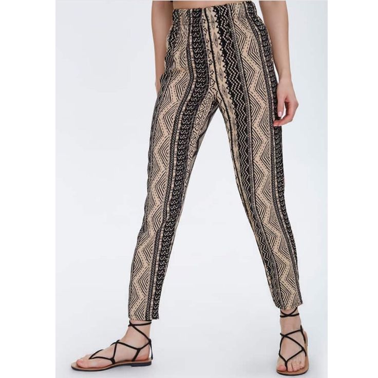 A Pair Of Lightweight Woven Pants Featuring A Geo Print, Elasticized High-Rise Waist, And A Tapered Leg. - This Is An Independent Brand And Not A Forever 21 Branded Item. Content + Care - 100% Polyester - Hand Wash Cold Size Medium Taupe/Black New, Never Worn. With Tags! Forever 21 High-waisted Summer Pants, Forever 21 Fitted Bottoms With Elastic Waistband, Stretch Bottoms From Forever 21, Fitted Forever 21 Bottoms With Elastic Waistband, Trendy Summer Pants By Forever 21, Forever 21 Stretch Long Pants, Forever 21 Casual Straight Pants, Forever 21 Trendy Summer Pants, Forever 21 High-waisted Stretch Pants