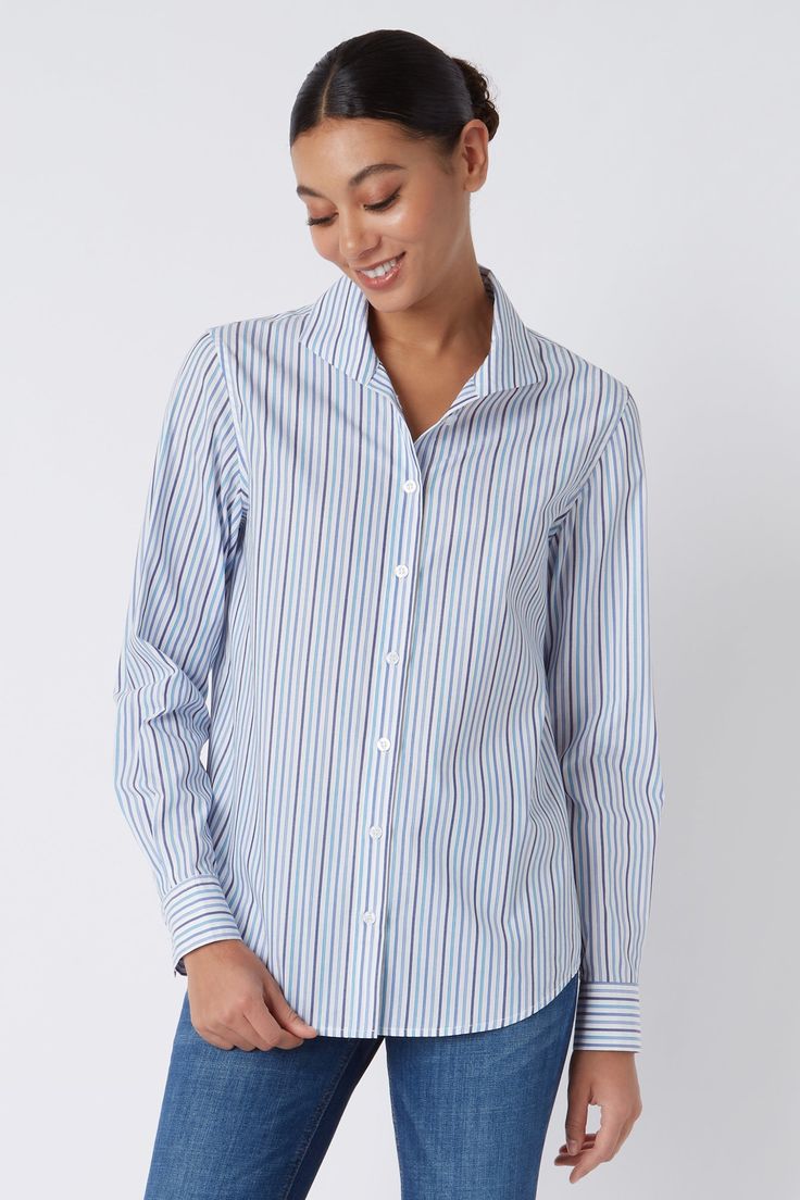 With a tailored look yet an ease of fit, our Box Pleat Ginna shirt is made for women on the move. A unique single piece collar construction can be worn up or softly folded befitting your mood.THIS ITEM IS FINAL SALE. Back box pleat, center front exposed button closure, classic cuff length, sleeve placket detail, and signature loop detail. - 100% Cotton - Made in NYC - Dry clean or machine wash - Our model is 5'9" wearing size 4 - Chest Width 40", Hip Width 45", Length 28" Orders are processed wi Daywear Tops With Striped Spread Collar, Elegant Top With Striped Spread Collar, Work Shirt With Striped Collar And Shirttail Hem, Workwear Shirt With Striped Collar And Shirttail Hem, Classic Striped Blouse With Shirttail Hem, Elegant Top With Striped Fold Down Collar, Striped Collar Shirttail Hem Top, Classic Top With Striped Collar For Daywear, Modern Top With Striped Collar For Work