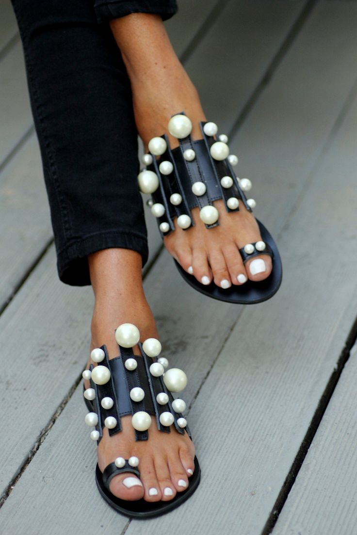 Featuring a new and unique shape, the Grace Kelly sandals are handcrafted in Greece with vachetta leather and faux matte pearls. This design is dedicated to to the dreamy and fairytale wedding of Grace Kelly. The sole is rubber and anti-slippery. Handcrafted in Athens, Greece. -Sizes available: 5 to 11.5 US Women's / 35 to 42 Europe Please note that all of our items are made to order and will take 15-20 days to be made. High Heels Black, Blue Bayou, Pearl Decor, The Grace, Diy Shoes, Casual Flats, Grace Kelly, Fairytale Wedding, Metal Charm