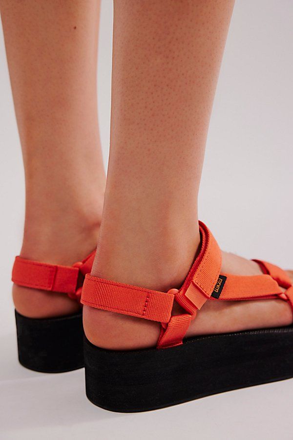 Take the classic Universal Teva and add a flatform to get this super cool and updated style. Comfortable and easy to wear with adjustable straps. * Hook and loop closures * Contoured footbed | Teva Flatform Universal Sandals at Free People in Orange, Size: US 10 Summer Everyday Strap Sandals, Summer Beach Sport Sandals With Heel Loop, Summer Double Strap Platform Sport Sandals, Double Strap Sport Sandals For Summer, Summer Synthetic Sport Sandals For Everyday Wear, Open Toe Sport Sandals For Everyday Summer Use, Everyday Open Toe Sport Sandals For Summer, Casual Wedge Sandals With Adjustable Ankle Strap, Everyday Sport Sandals With Round Toe For Summer