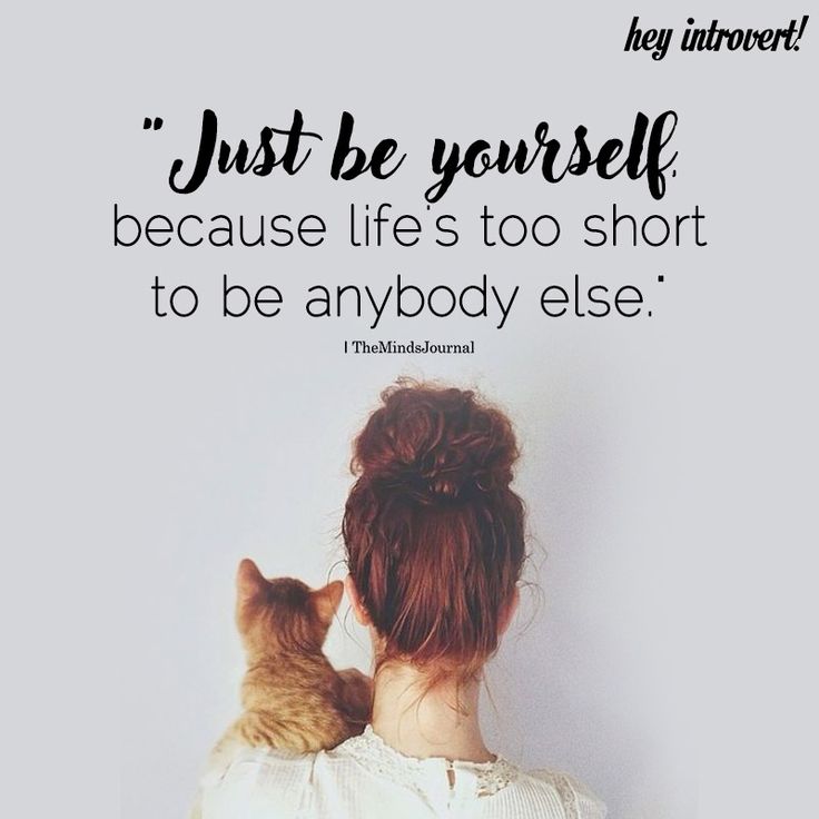 a woman holding a cat in her arms with the caption just be yourself because life's too short to be anybody else