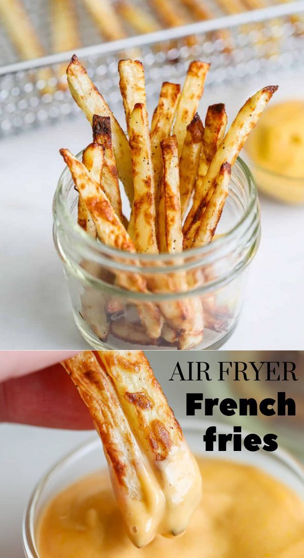 crispy air fryer french fries in a glass bowl with dipping sauce on the side