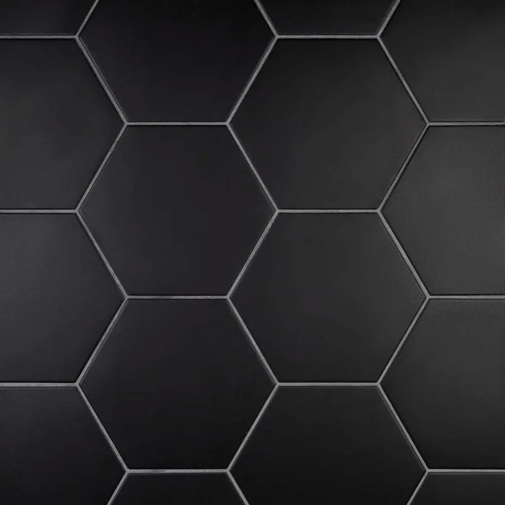 black hexagonal tiles with white lines on them