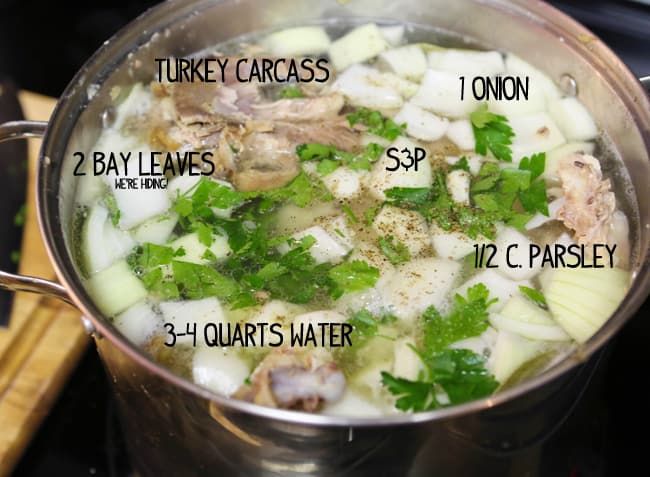 a pot filled with lots of food on top of a stove