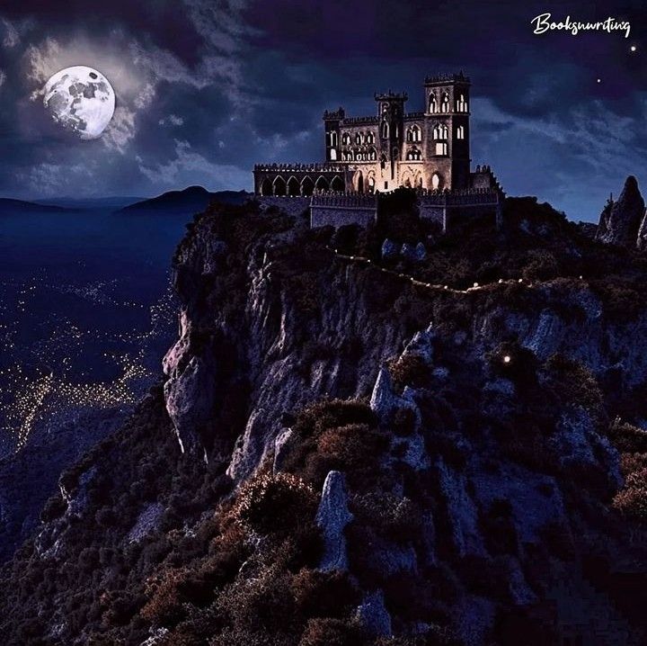 an old castle on top of a mountain at night with the moon in the sky