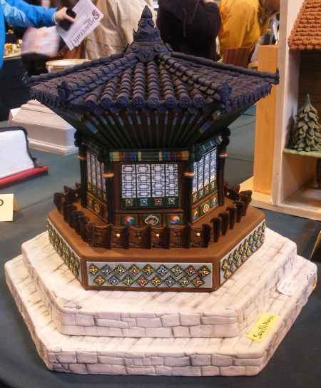 a model of a building on display for people to see