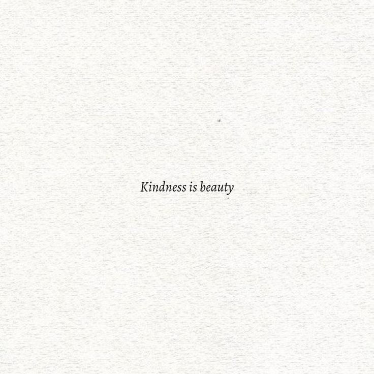 the words kindness is beauty written in black on white paper