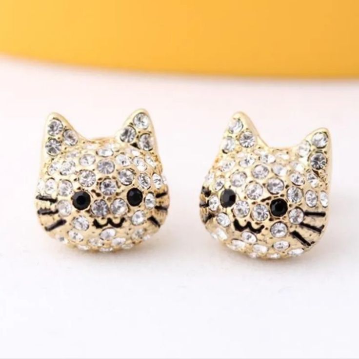 New Never Worn, Kitty Cat Face Stud Earrings With Bling Crystal Stones All Over. Black Stones For His Eyes, Super Cute! The Red Things You See On The Ear Posts Are Just Protective Covers, You Remove Before Wearing. Box 6 Listing Vintage And New Jewelry Daily, Bundle And Save, Reasonable Offers Welcome. I Sell In My Closet And Have Tons Of Other Brands Similar To List Such As Kirk's Folly, Warner, Hollycraft, Saint John, Ralph Lauren, Swarovski, Coro, Dior, Donald Stannard, Lisner, Renoir, Eisenb Cat Earrings Studs, Animal Cartoon, Cat Jewelry, Crystal Stud Earrings, Cat Earrings, Lovely Earrings, Girls Earrings, Animal Jewelry, Fashion Accessories Jewelry