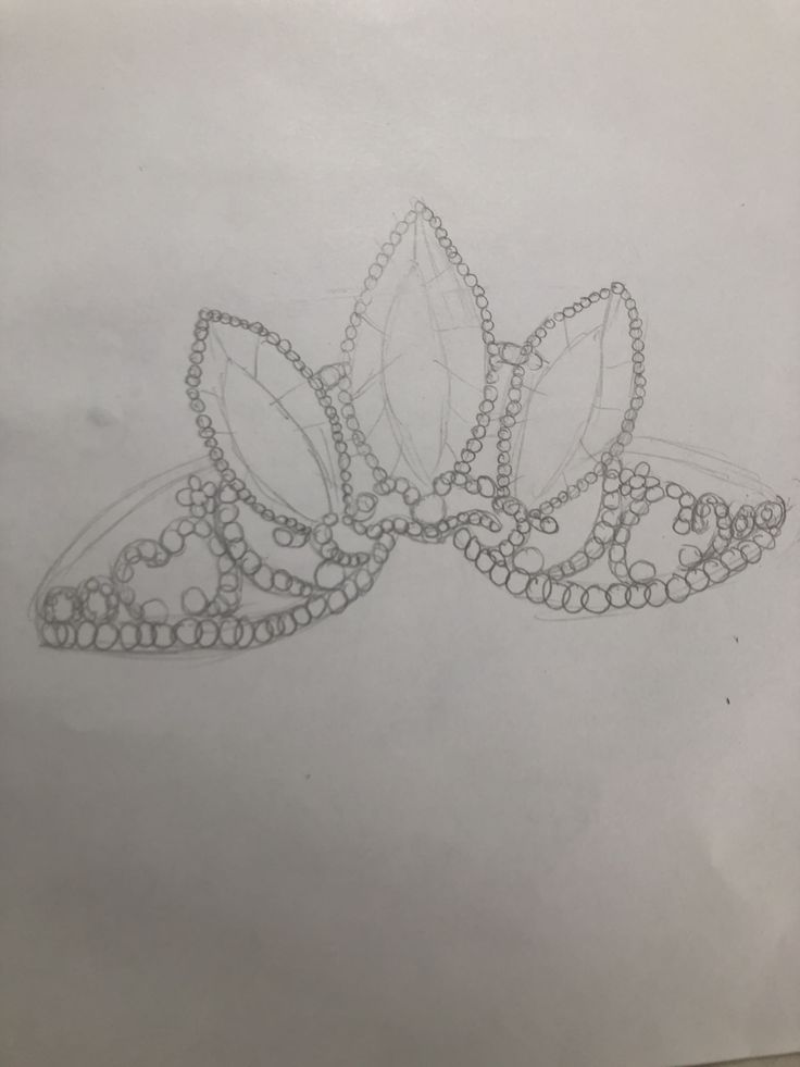 a drawing of two leaves with beads on them