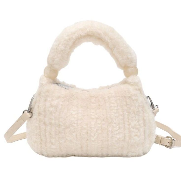 Discover Your New Fashion Favorite Step out in style with the Plush Faux Fur Hobo Handbag, a perfect blend of elegance and practicality. This handbag is not just an accessory; it's a statement piece that complements any outfit, whether you're on a casual day out or a special evening event. Its versatile design ensures it fits seamlessly into any wardrobe, making it ideal for all your fashion needs. Exceptional Features Material: Luxurious faux fur that's soft to the touch yet durable. Size: Compact yet spacious - 9.8x2.6x5.9", perfect for your essentials. Interior: Includes a handy cell phone pocket to keep your phone accessible. Multiple Carrying Options: Comes with a long shoulder strap and a short handle for varied styles. Closure: Secure zipper closure to keep your belongings safe. Sty Winter Shoulder Bag With Zipper For On-the-go, Winter Shoulder Bag With Zipper Closure For On-the-go, Winter Shoulder Bag With Zipper For Everyday Use, Chic Winter Shoulder Bag With Zipper Closure, Everyday Winter Shoulder Bag With Zipper, Winter Bags With Zipper Closure For Everyday, Winter Rectangular Shoulder Bag With Detachable Strap, Winter Everyday Bag With Zipper Closure, Everyday Winter Bags With Zipper Closure