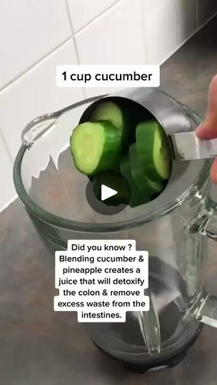 cucumbers being squeezed into a blender with instructions