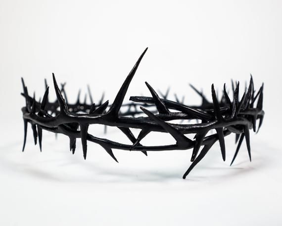 a crown made out of spikes on a white background