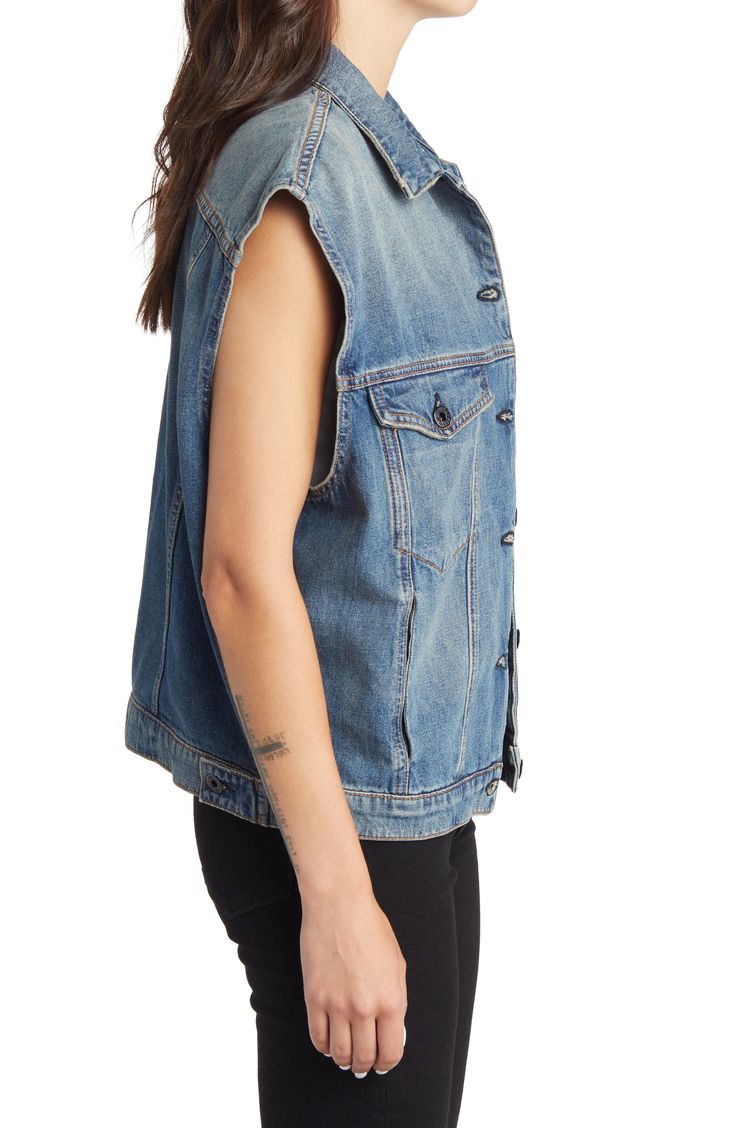 This oversized nonstretch-denim vest features soft fading for a lived-in vibe and an array of handy pockets to store your essentials. 22 1/2" length (size Medium) Front button closure Spread collar Chest button-flap patch pockets; side-seam pockets 100% cotton Machine wash, line dry Made in the USA Casual Medium Wash Denim Vest, Medium Wash Sleeveless Washed Vest, Casual Medium Wash Washed Vest, Casual Washed Denim Vest, Casual Medium Wash Vest, Washed Blue Sleeveless Vest With Pockets, Trendy Medium Wash Vest, Relaxed Fit Denim Vest With Pockets, Casual Distressed Sleeveless Denim Jacket