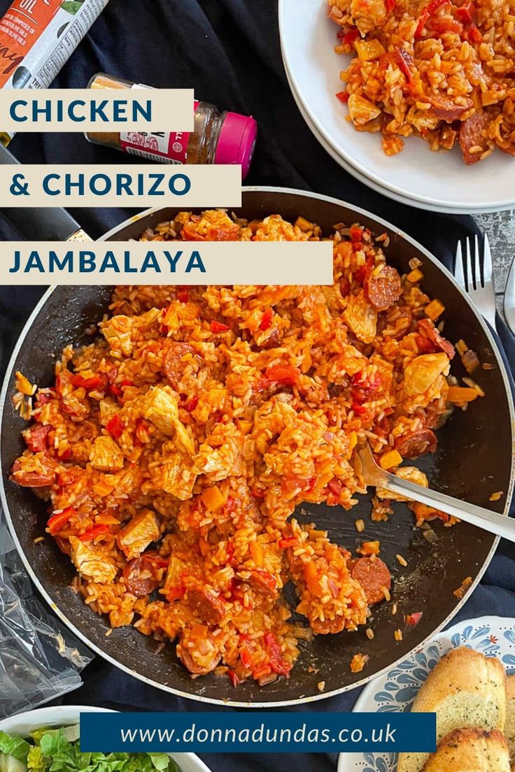 chicken and chorizo jambalya in a skillet next to other dishes