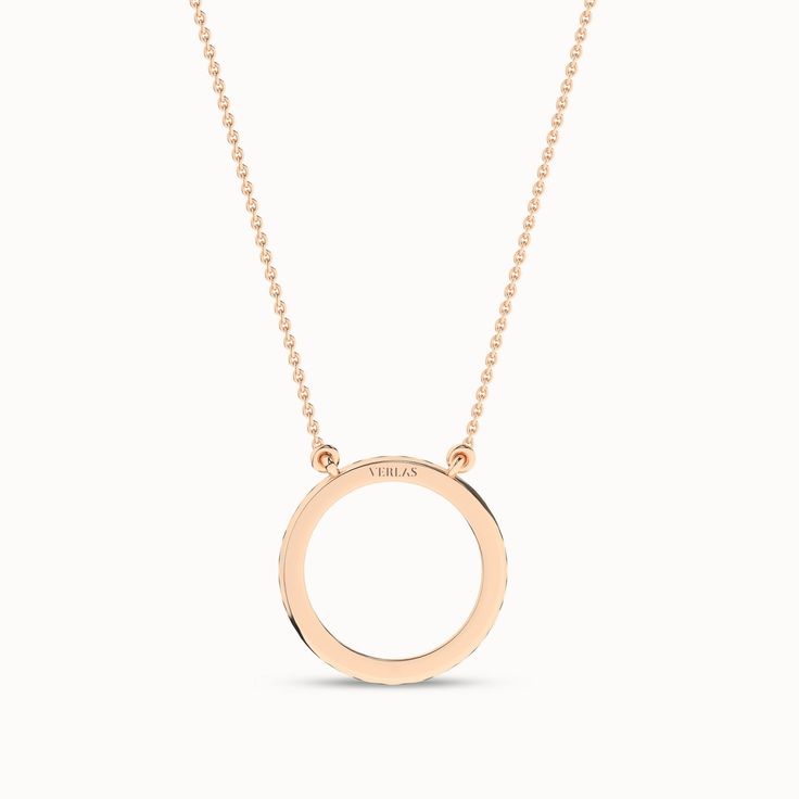 The Circular Silhouette Necklace is a testament to timeless style. It has a diamond-studded circular pendant that captures the essence of enduring love. This piece transforms any ensemble into a captivating look. It’s more than just a necklace; it’s a circle of endless possibilities. Elegant 14k Gold Full Circle Necklace, Modern Round Diamond Necklace With Adjustable Chain, Timeless Yellow Gold Circle Jewelry, Timeless Halo Necklace With Round Pendant, Luxury Circle Jewelry For Anniversary, Luxury Circular Jewelry For Anniversary, Timeless Round Halo Necklaces, Timeless Halo Style Round Pendant Necklace, Timeless Round Halo Necklace