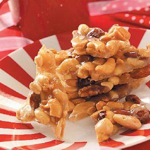 a pile of nuts sitting on top of a red and white plate