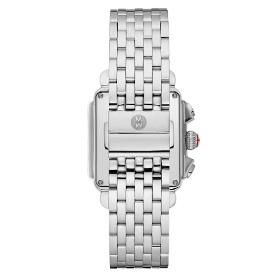 Inspired by the geometric shapes of Art Deco architecture, the Michele Deco Diamond watch embodies everyday elegance and is hand-set with 120 diamonds. 35mm rectangular stainless steel case Silver-tone mirror dial with 12 diamonds and Swiss chronograph movement Seven-link stainless steel bracelet with push-button deployment clasp; interchangeable with any 18mm Michele strap Modern Rectangular Watches With Metal Dial, Silver Square Watch With Metal Dial, Modern Silver Watch With Rectangular Dial, Modern Silver Watches With Rectangular Dial, Luxury Diamond Watch With Rectangular Stainless Steel Dial, Modern Silver Diamond Watch Accessories, Stainless Steel Diamond Watch With Rectangular Dial, Luxury Square Watch With Diamond Hour Markers, Modern White Gold Watch With Rectangular Dial