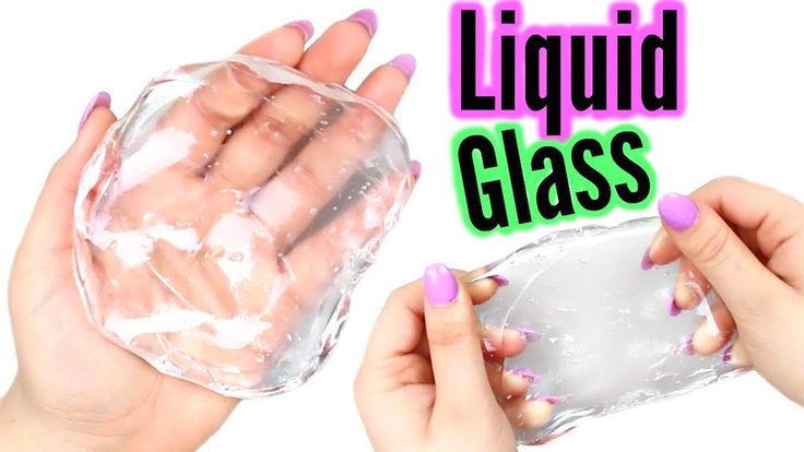 two hands holding a glass container with liquid in it and the words liquid glass on top