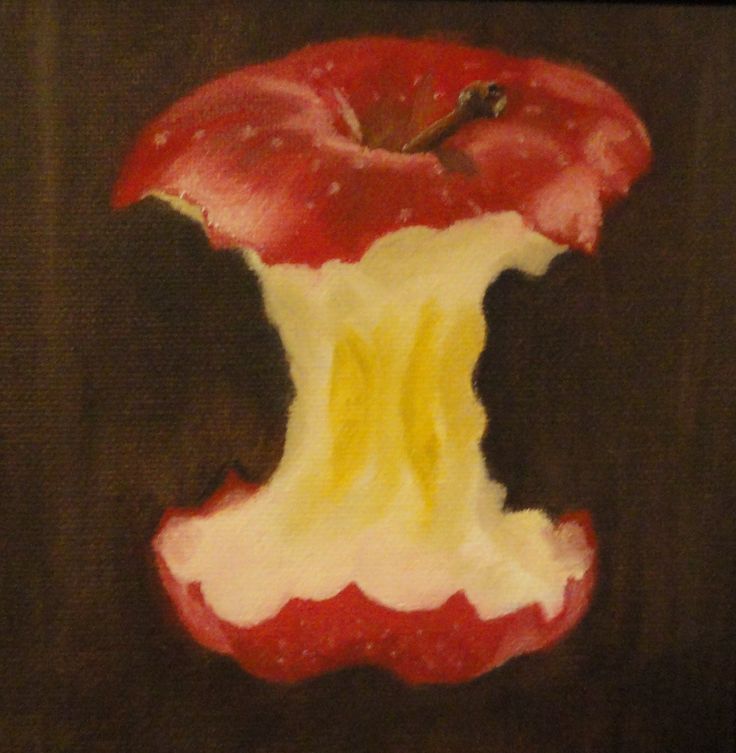 an apple with the letter m painted on it