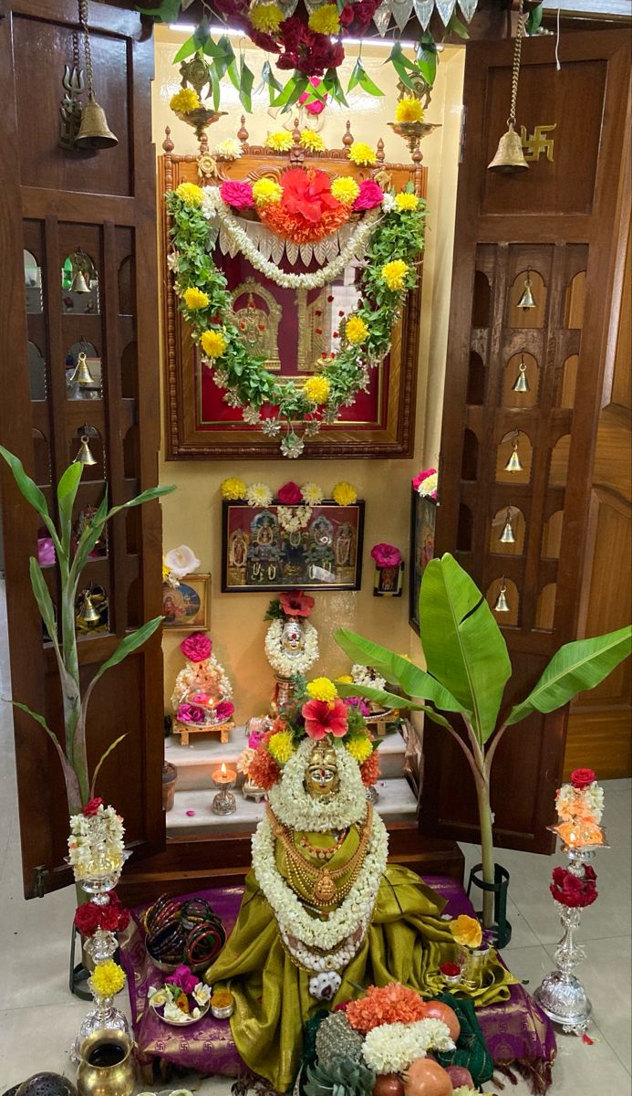 there is a shrine with flowers and other decorations