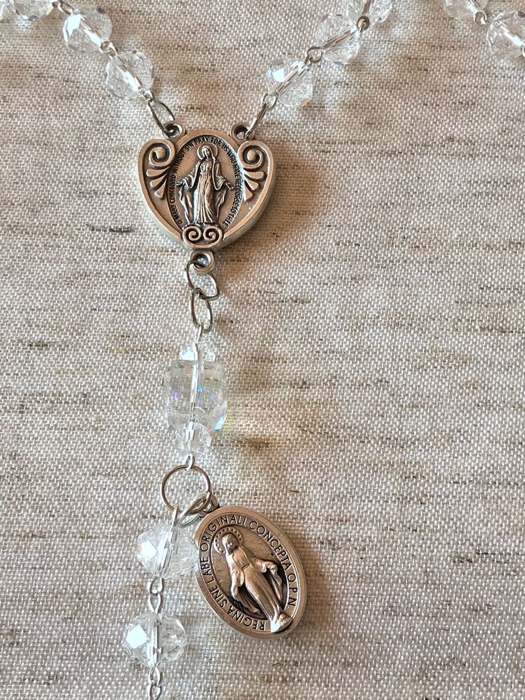 A personal favorite from my Etsy shop https://www.etsy.com/listing/593316824/large-april-birthstone-rosary April Birthstone, Miraculous Medal, Rosary, Crystal Beads, Birthstone, Silver Tone, Etsy Shop, Pendant Necklace, Beads