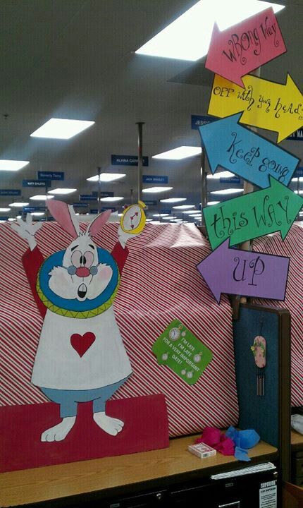 an office cubicle decorated with signs and posters for teachers to use on their desks