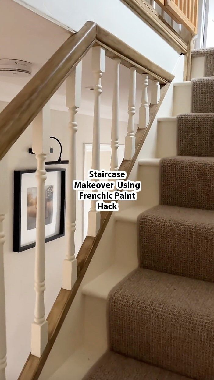 the stairs in this house have been painted white with brown carpet and wood handrails