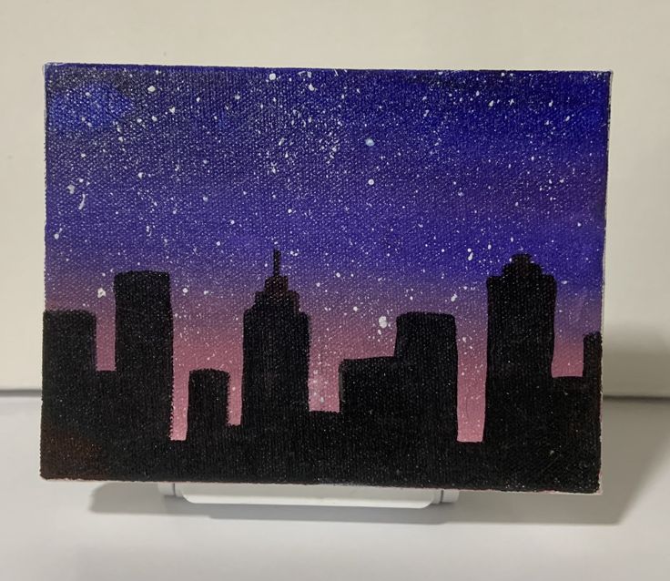 a painting of a city at night with the stars in the sky and buildings painted on it