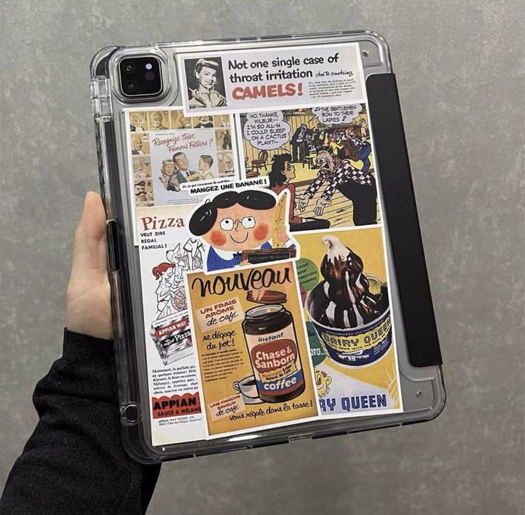 a person holding up a case with advertisements on it