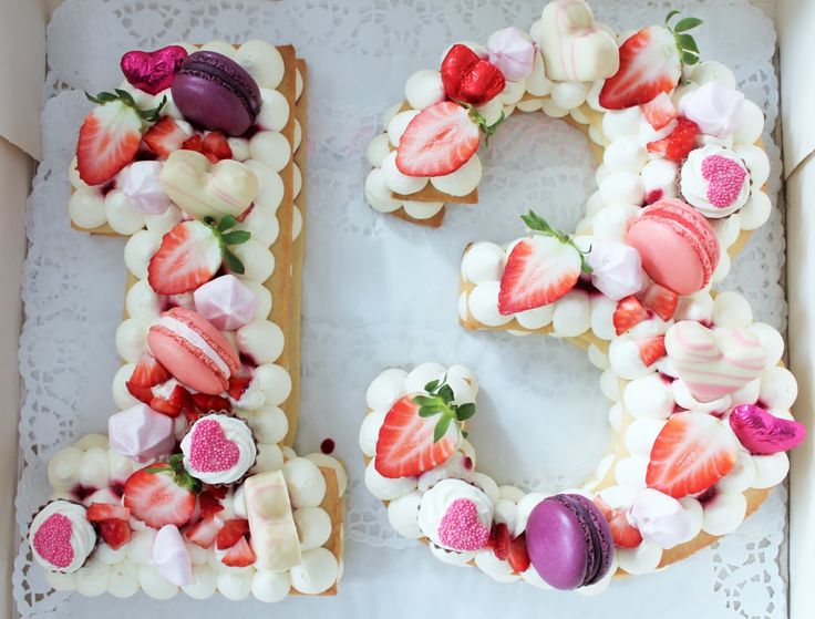 the letter e is made out of cookies and strawberries