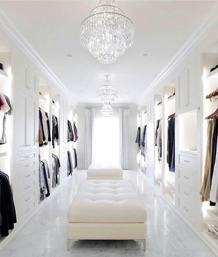 a white room with lots of closet space