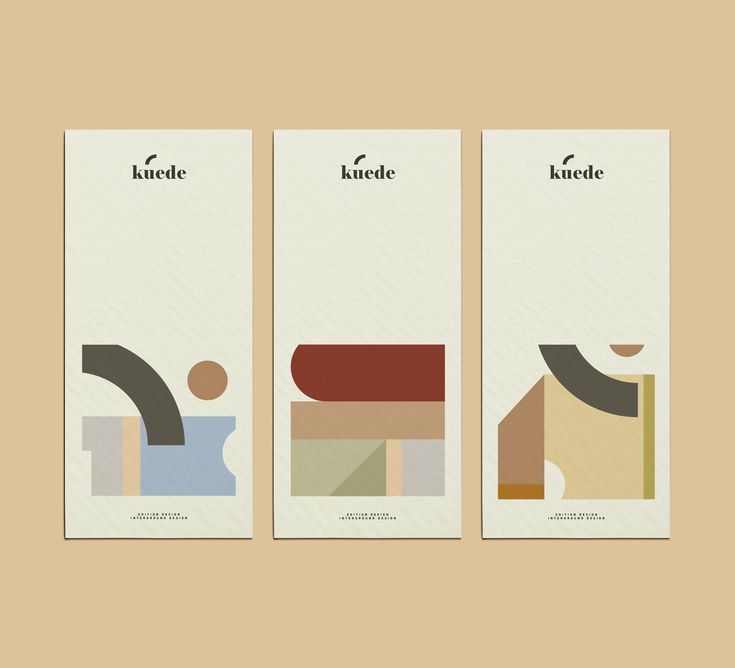 three bookmarks with different shapes and colors on them, one has a brown background