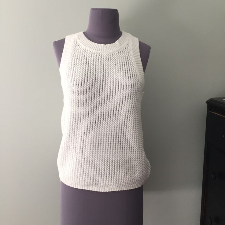 Summer Knit Sleeveless Sweater From Anthropologie. New With Tags, Never Worn. 100% Cotton. Machine Wash Cold, Tumble Dry Length 23” Across Chest 16.5 Inches *** I Bought Two Sizes And Have Worn The Other Size All Summer. It’s A Great Top To Wear With Jeans Or Flowy Linen Pants. Also Perfect Under A Blazer. Open Knit Layering Tank Top, White Stretch Crew Neck Sweater Vest, Chic Cotton Sweater Vest With Textured Knit, Chic Cotton Textured Knit Sweater Vest, Sleeveless Knitted Cotton Sweater, Chic Textured Knit Cotton Sweater Vest, Chic Open Knit Sweater Vest, Textured Knit Cotton Tank Top For Layering, Cotton Textured Knit Tank Top For Layering