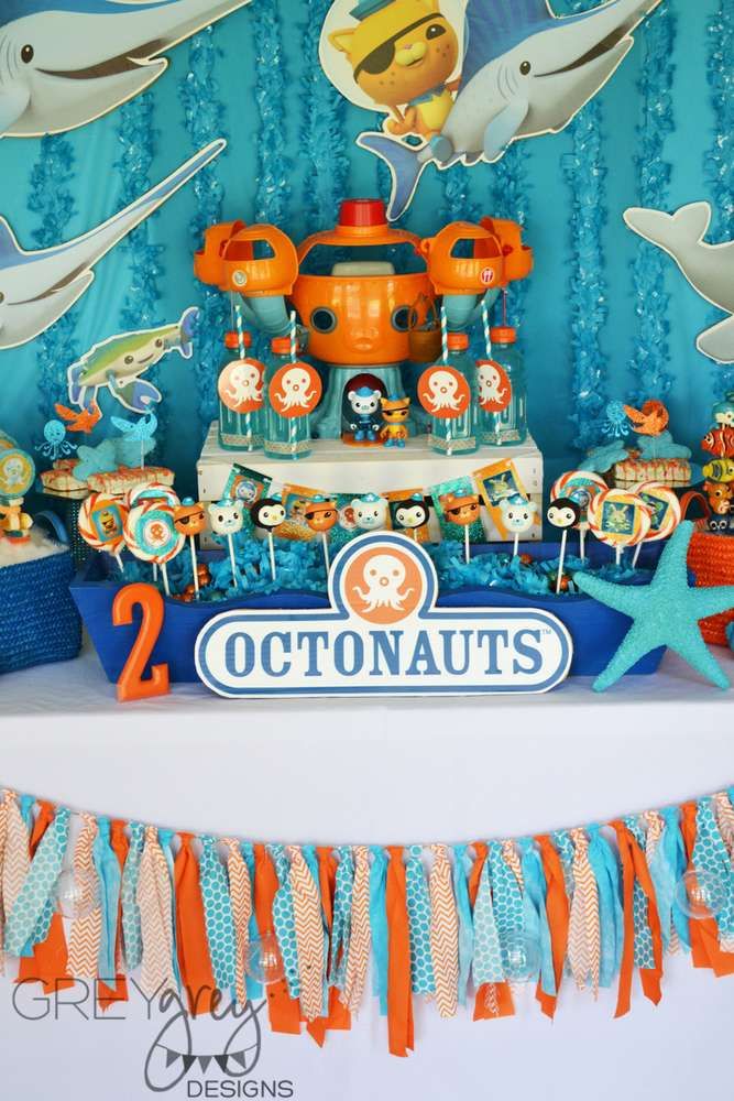 an ocean themed birthday party with orange and blue decorations